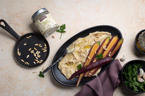 Recette image Hummus di cannellini con carote viola, Tahin e pinoli